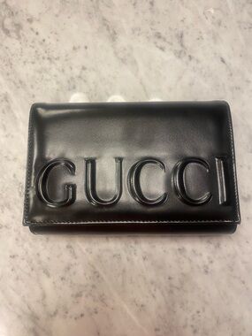 Black Embossed Logo Leather Clutch Wallet